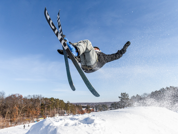 Skier going off of a jump